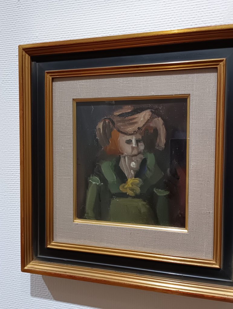 山崎隆夫「人形」　1929年頃　油彩、カンヴァス、芦屋市立美術博物館蔵　人形の鼻筋の白い筆は小出の筆とされる。